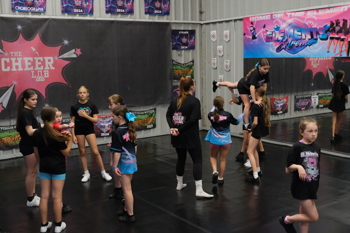 Kids in a cheerleading class