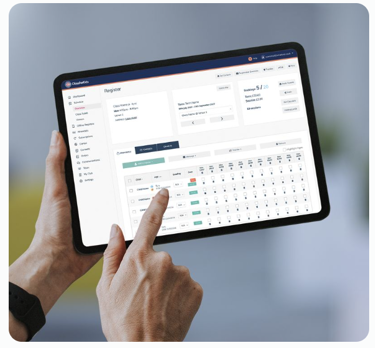 Hand holding a tablet pointing to the ClassForKids Wraparound Care management software